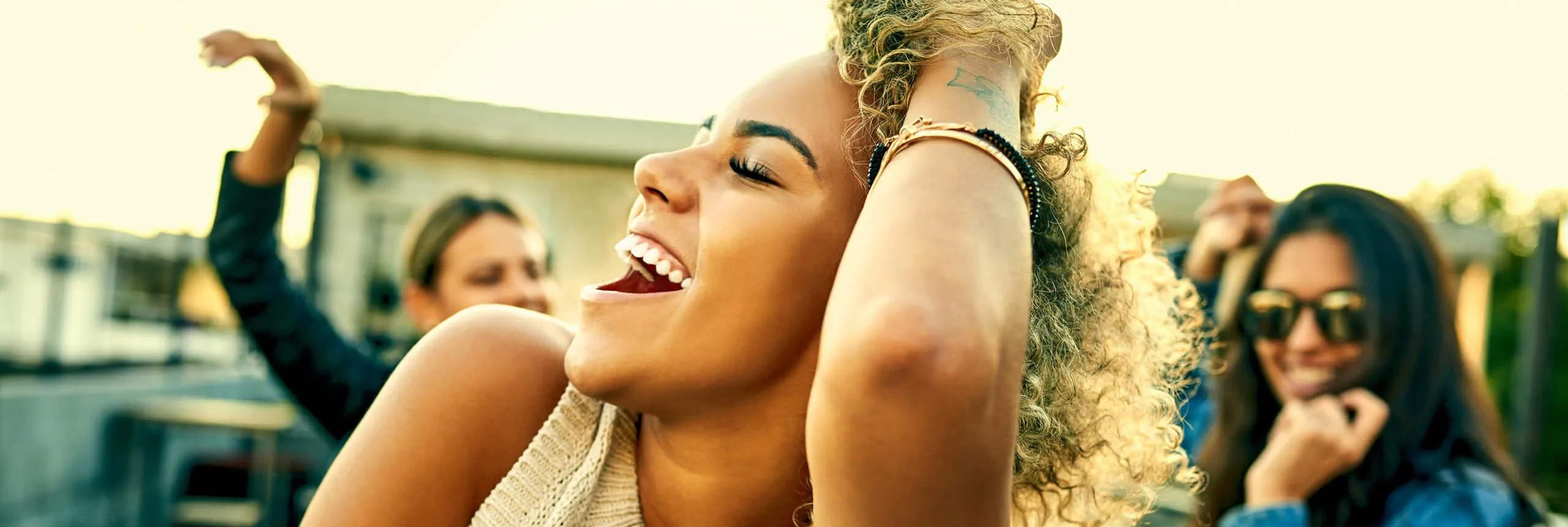 Women dancing happily