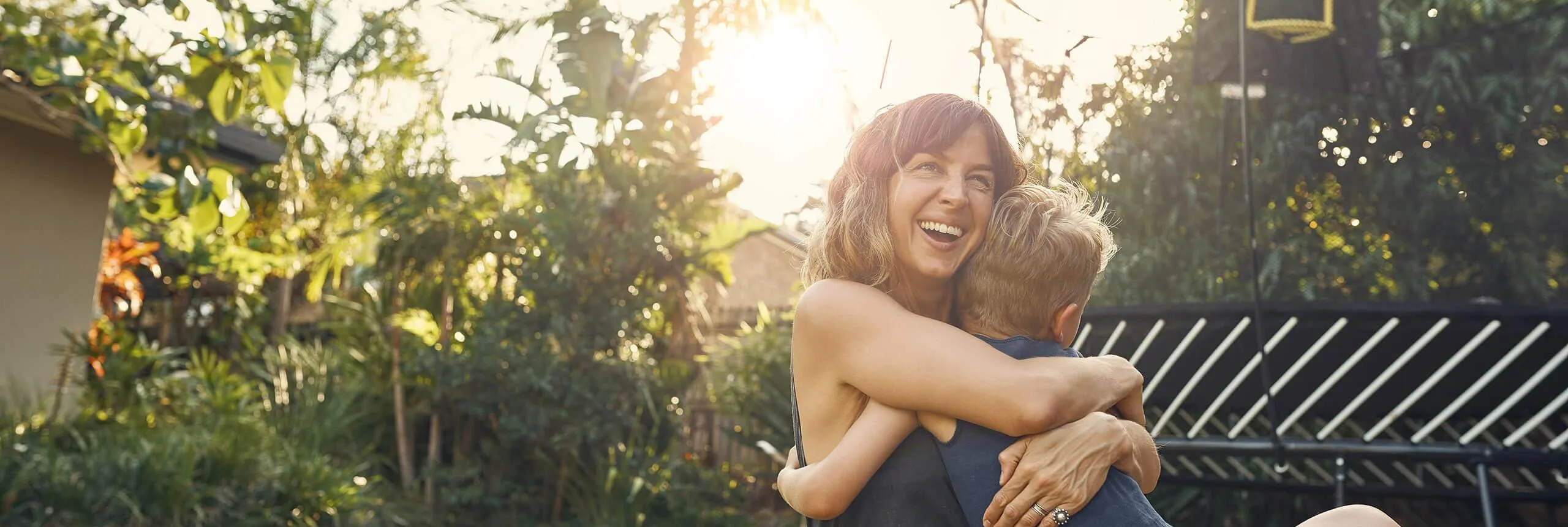 Woman smiling with boy